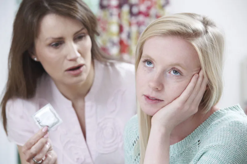 A parent having an open, age-appropriate conversation about sex with their child.