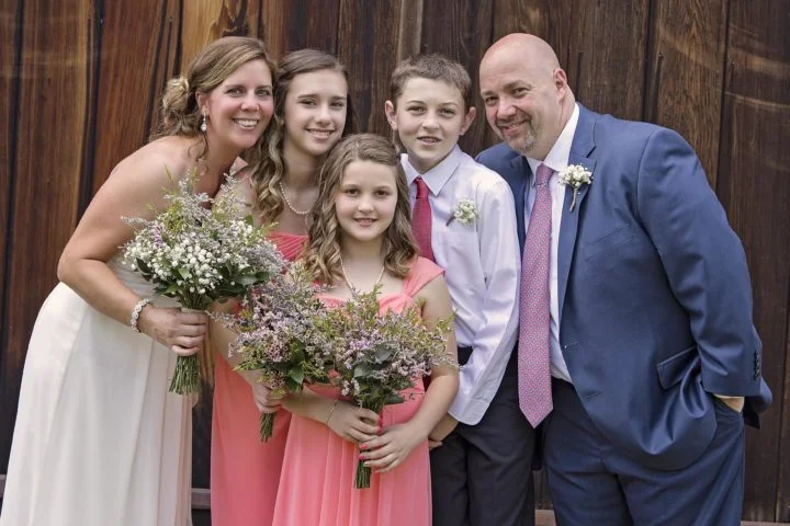 A blended family formed after a remarriage, including children from previous relationships.