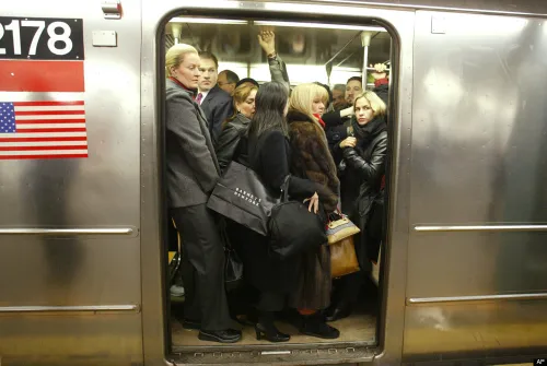 Crowded subway passengers standing close together, the typical setting for frotteurism.